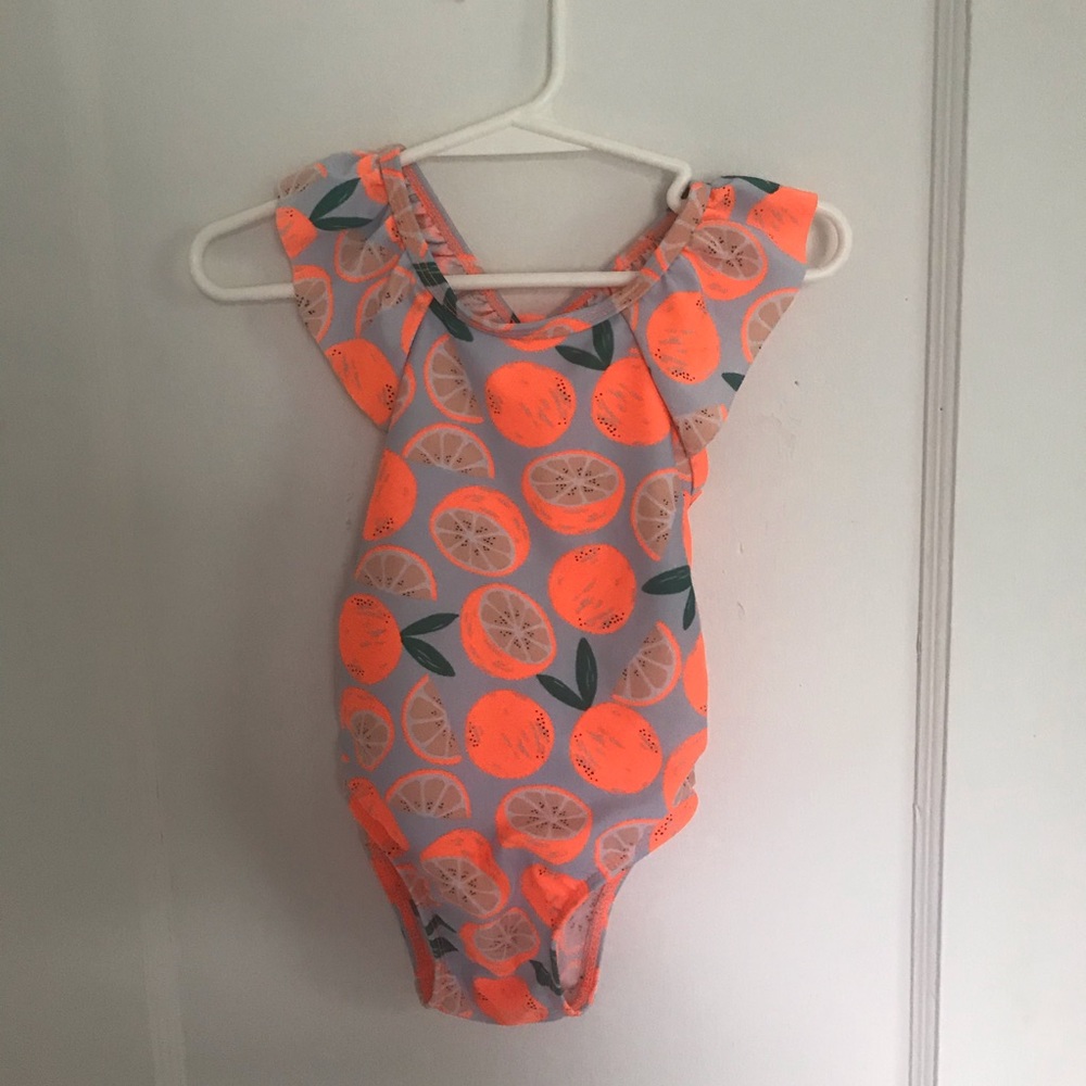 Lot of 4 toddler bathing suits.